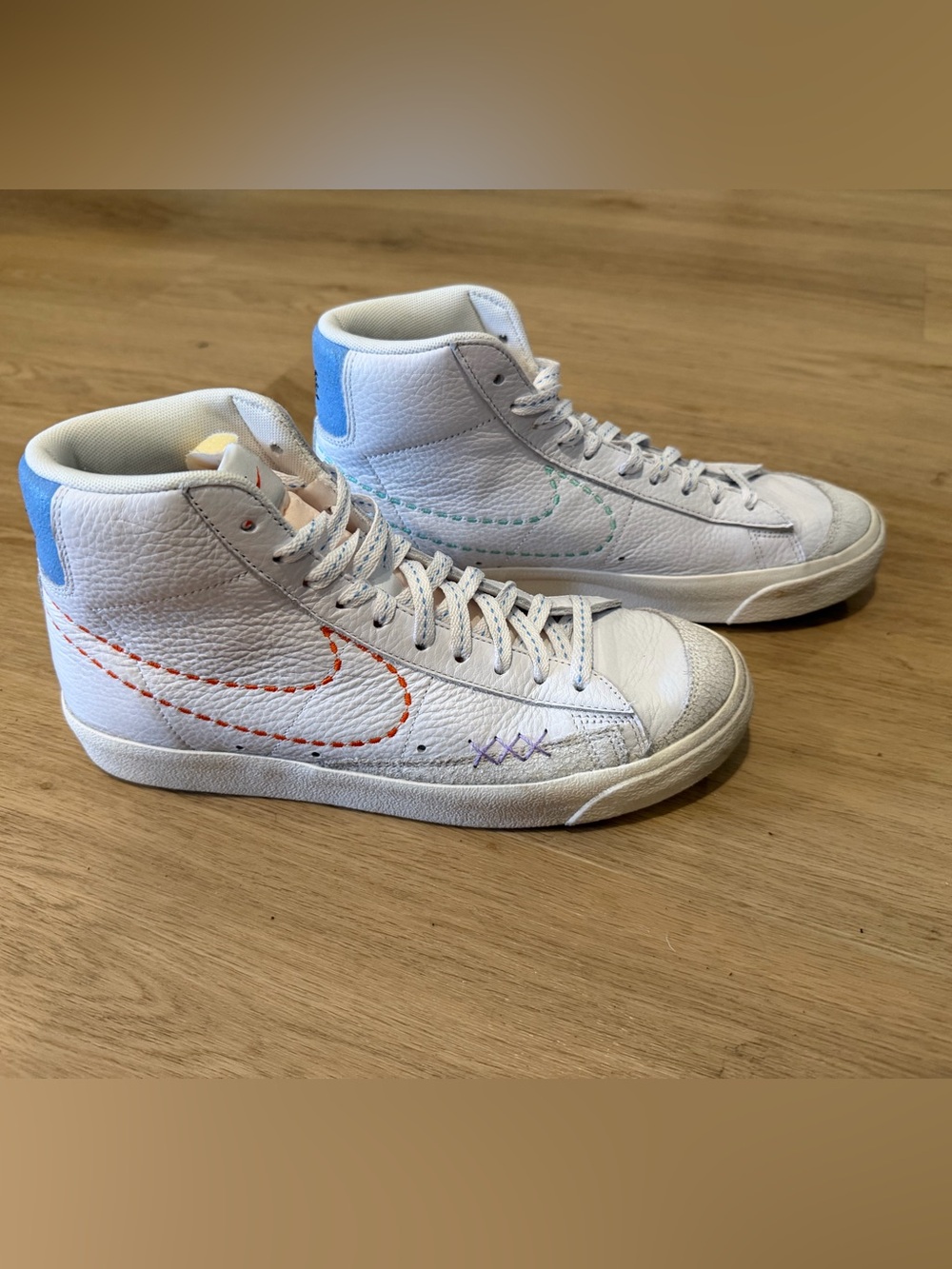 NWOT- Nike White High-Top Sneakers with Blue Heel Tab and Multicolor Stitching